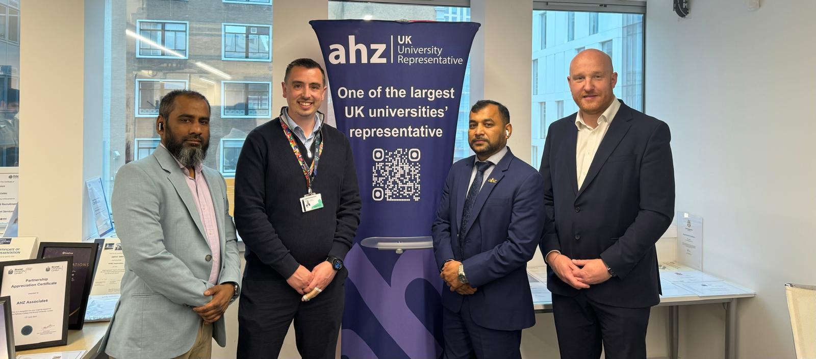 AHZ representatives with the Wrexham University partnership banner